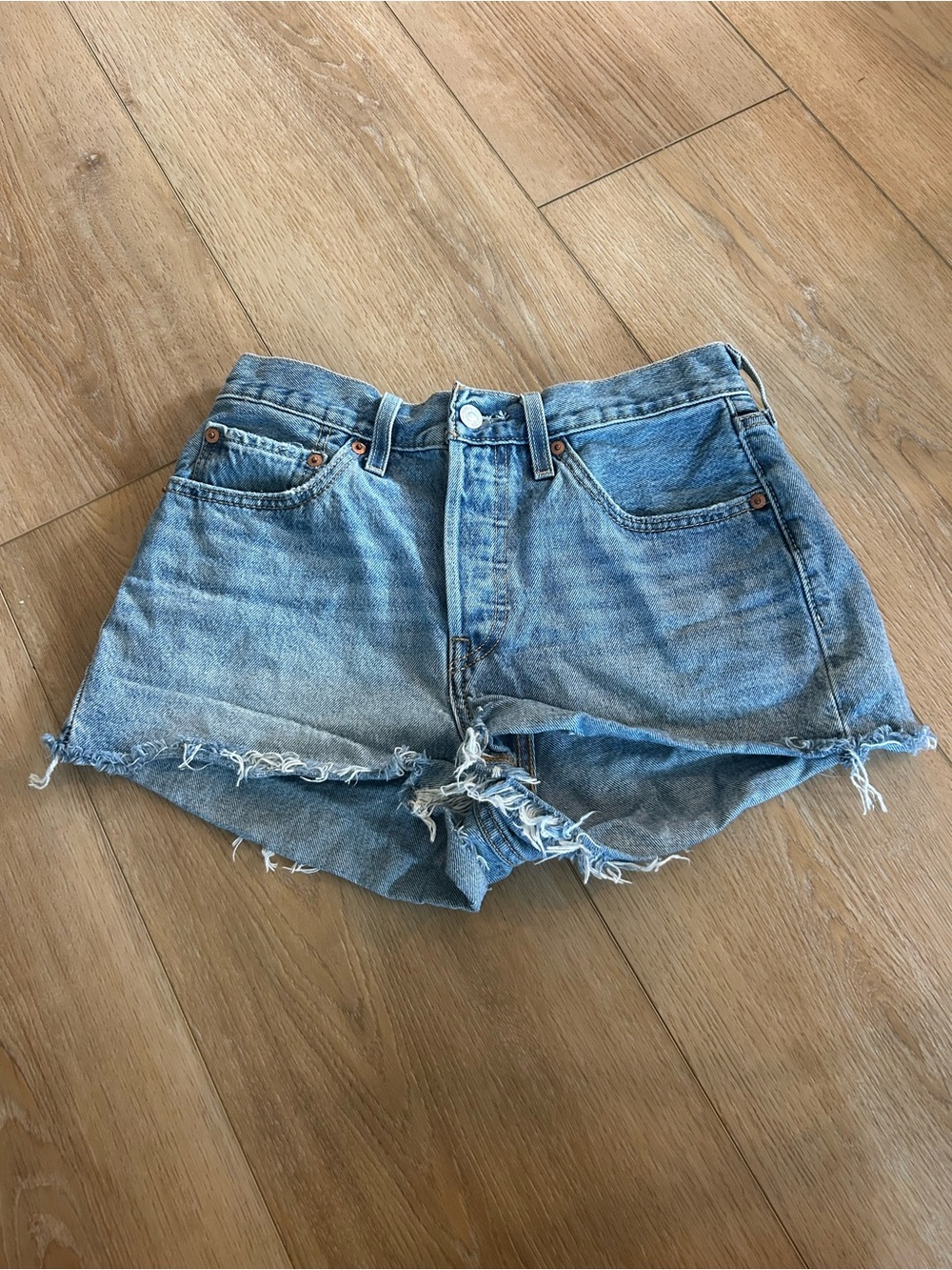 Levi's Light Blue Frayed Denim Cutoff Shorts